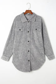 Textured corduroy overshirt in Cloudy Blue with faded wash, button front, and chest pockets.