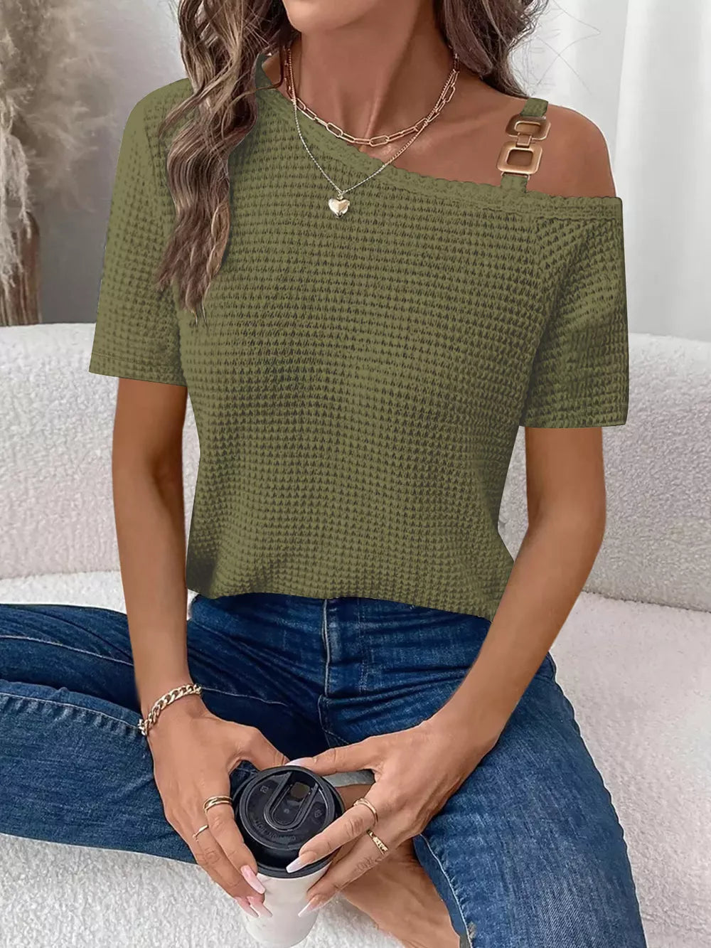 Moss waffle knit one-shoulder t-shirt with gold buckle detail.