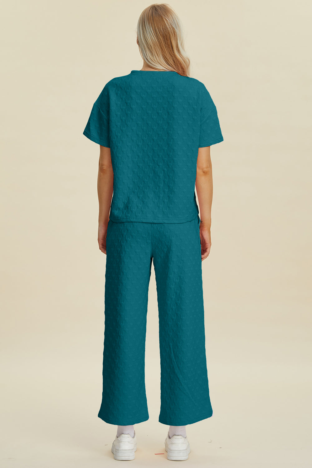 Cerulean textured knit loungewear set with wide leg pants and short sleeve top.