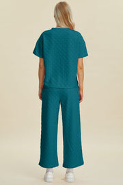 Cerulean textured knit loungewear set with wide leg pants and short sleeve top.