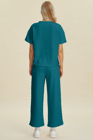 Cerulean textured knit loungewear set with wide leg pants and short sleeve top.
