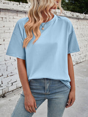 Light blue cotton oversized t-shirt with seam detail and crew neck.