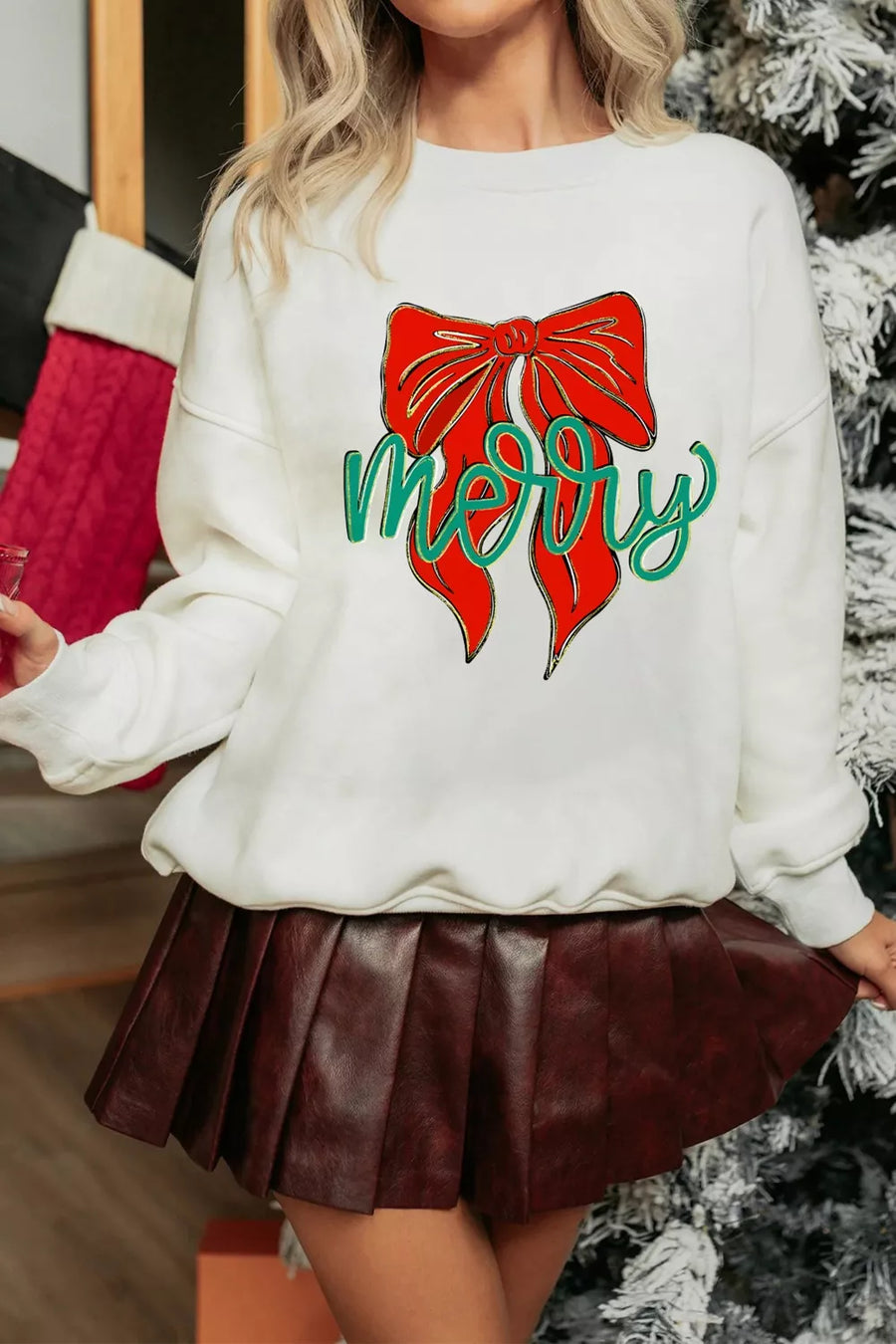 White crew neck sweatshirt with red bow and "merry" graphic, cozy cotton feel