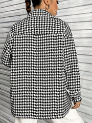 Black houndstooth overshirt with a classic collar and button cuffs.