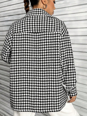 Black houndstooth overshirt with a classic collar and button cuffs.