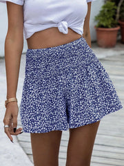 Blue floral elastic waist chino shorts with a comfortable fit.