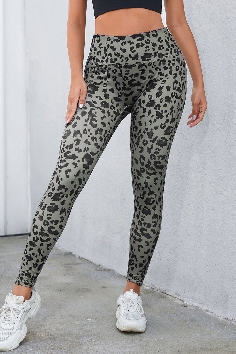 Sculpted leopard print performance leggings in dark gray with a high waist.
