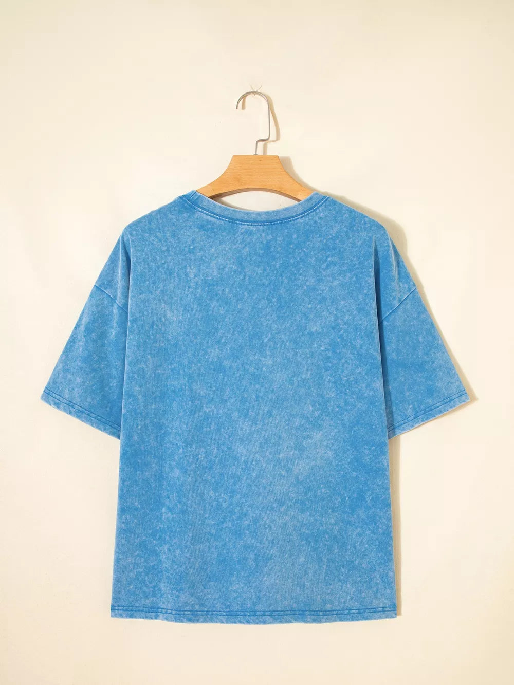Mineral washed blue cotton crew neck oversized t-shirt with short sleeves.