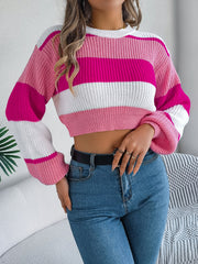 Striped crop knit sweater with balloon sleeves in pink, white, and cerise acrylic.