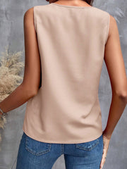 Apricot sleeveless blouse with a round neckline, shown from the back.