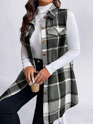 Oversized plaid shirt vest in black and white with button front and chest pockets.
