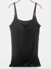 Black soft-cup cami with adjustable straps and a scoop neckline.