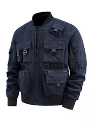 Blue bomber jacket with multiple cargo pockets and D-ring details.