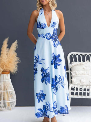 Light blue floral halter maxi dress with a deep V-neck and a-line skirt.