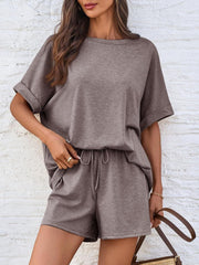 Taupe relaxed fit tee with cuffed sleeves and matching drawstring shorts.