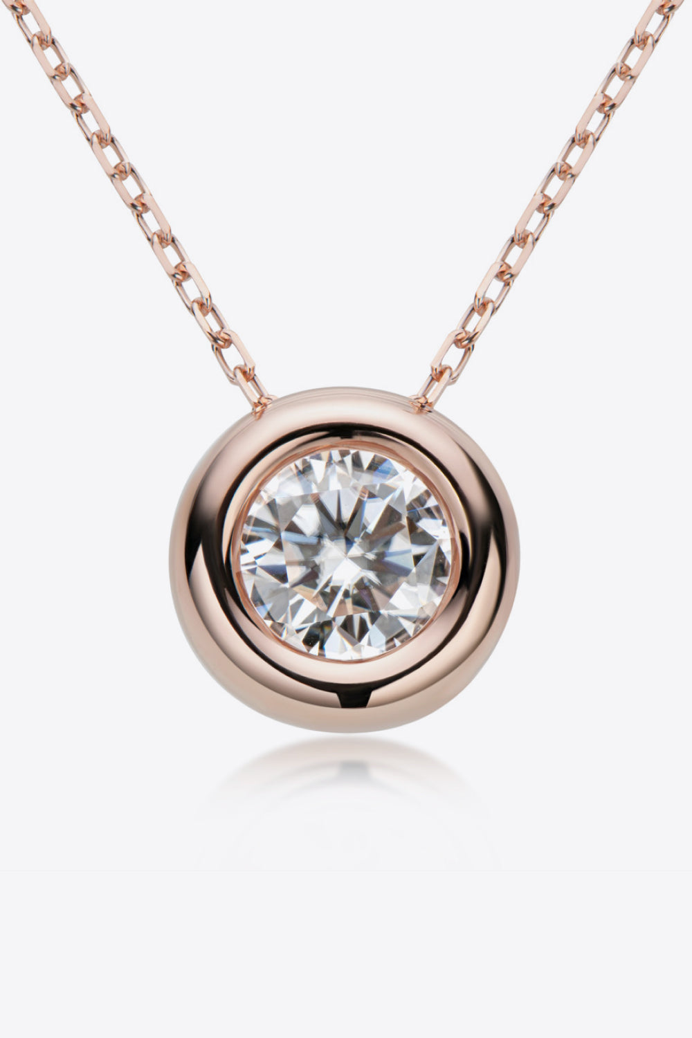 Rose gold necklace with bezel-set moissanite solitaire pendant and delicate chain.