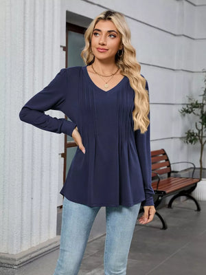 Navy blue V-neck long sleeve maternity t-shirt with subtle front pleats and a relaxed fit.