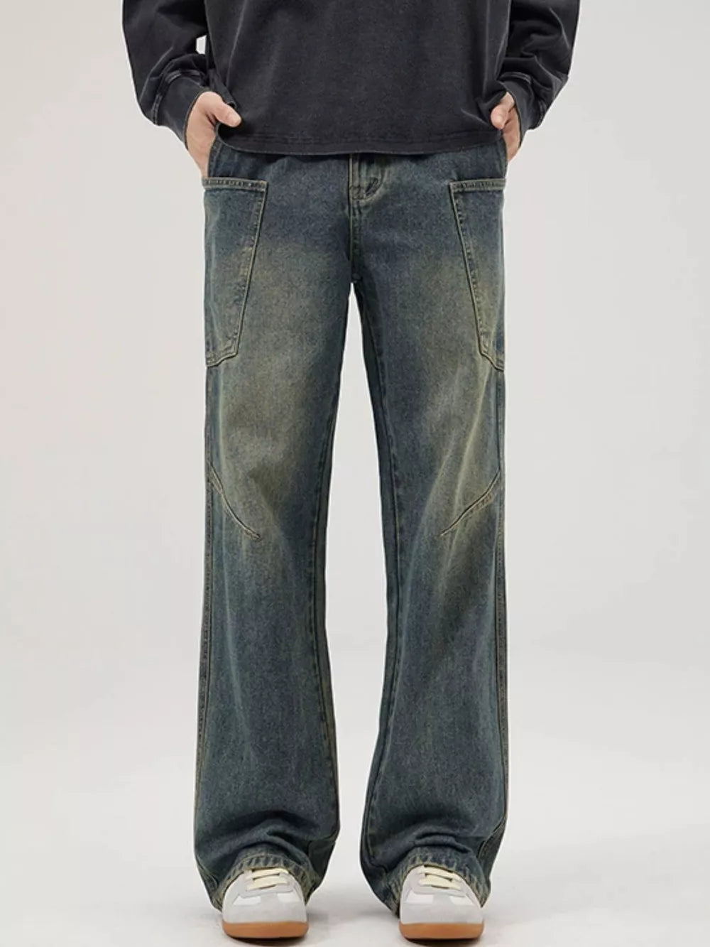 Relaxed fit vintage blue washed wide-leg jeans with cargo pockets and a comfortable cotton feel.