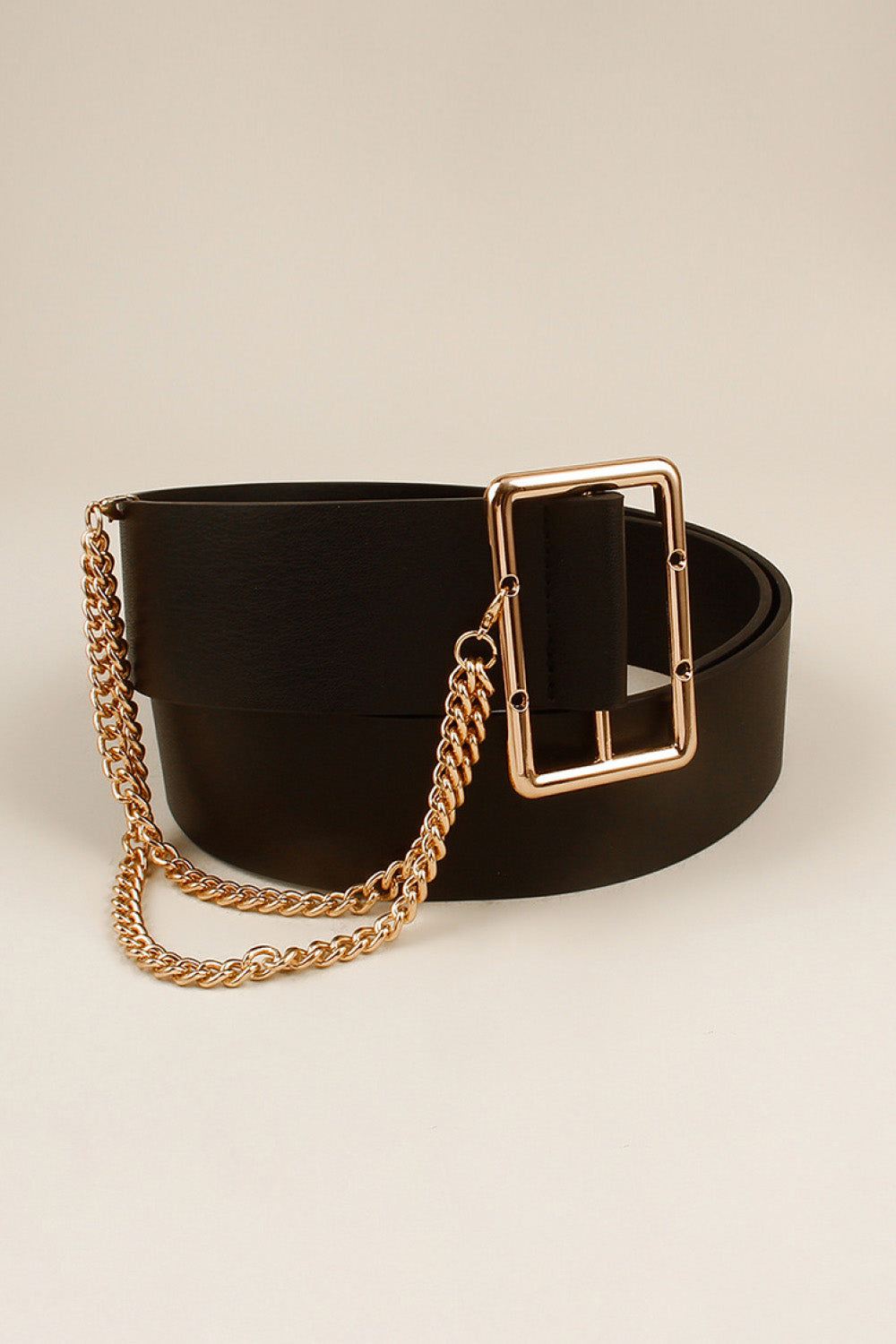 Black faux leather belt with gold chain detail and rectangular buckle.
