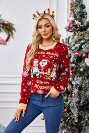 Red graphic knit sweater with Santa and snowmen, crew neck, acrylic, long sleeves.