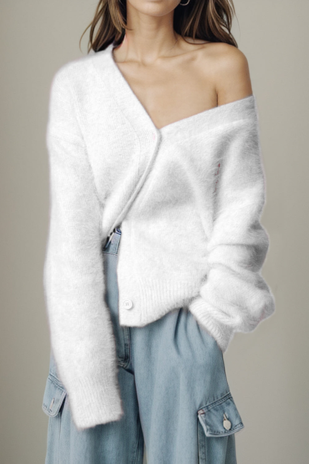 White fluffy angora V-neck cardigan with button detail and relaxed fit.