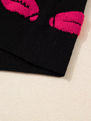 Black knit short-sleeve sweater with textured pink lips pattern