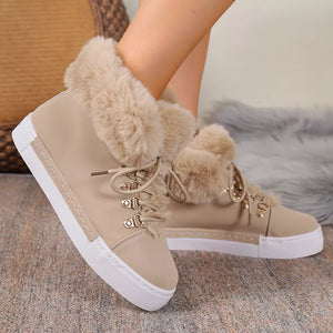 Apricot fluffy cuff round-toe platform boots with white soles and laces.