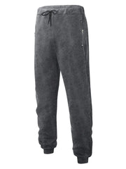 Dark gray fleece joggers with drawstring waist and zip pockets