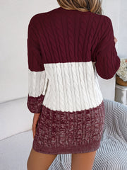 Colorblock cable knit mini dress in burgundy and white acrylic with long sleeves.