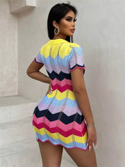 Zigzag knit short sleeve sweater dress in yellow and multi-color chevron pattern.