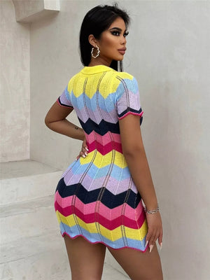 Zigzag knit short sleeve sweater dress in yellow and multi-color chevron pattern.