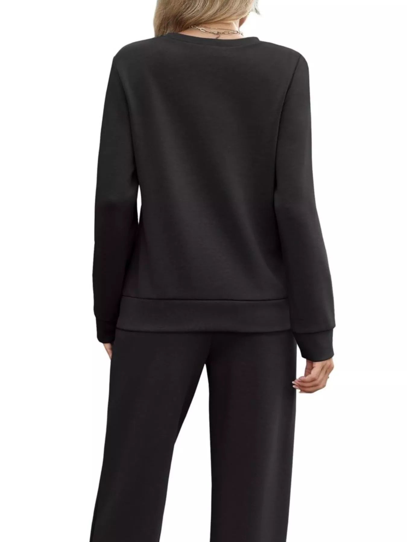 Black casual long-sleeve top and pants set with drawstring detail.