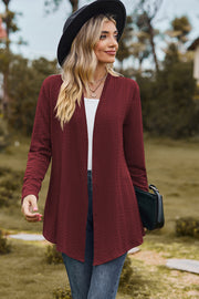 Burgundy textured open-front drape cardigan with long sleeves and a relaxed fit.