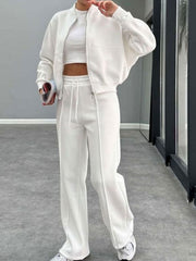 White bomber jacket and wide-leg tracksuit with drawstring waist