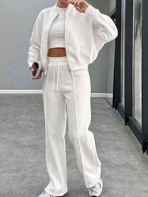 White bomber jacket and wide-leg tracksuit with drawstring waist