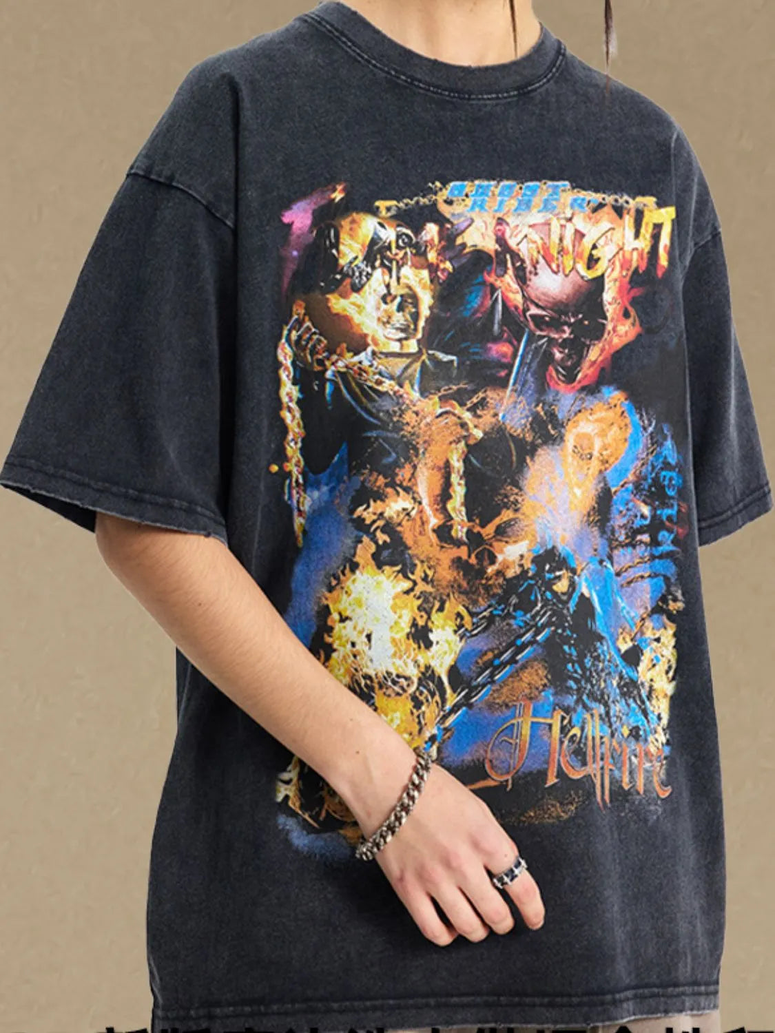 Black vintage graphic tee with oversized fit and fiery skull artwork.