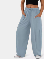 Air Force Blue wide-leg jeggings with drawstring waist and cargo pockets.