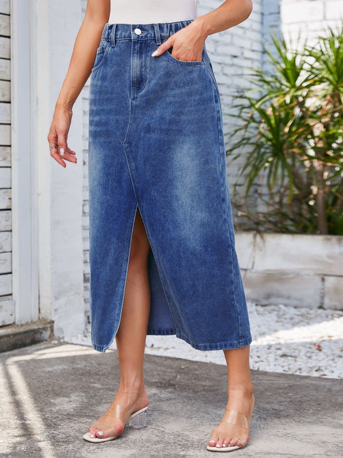 Light blue denim midi skirt with elastic waist and front slit