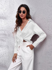 White satin collared button-down shirt with a knotted front detail.
