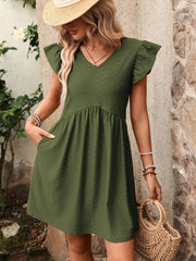 A-line dress in bean green with ruffled sleeves and textured fabric.