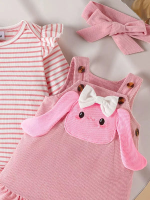 Pink corduroy bunny dress with white bow and striped bodysuit.