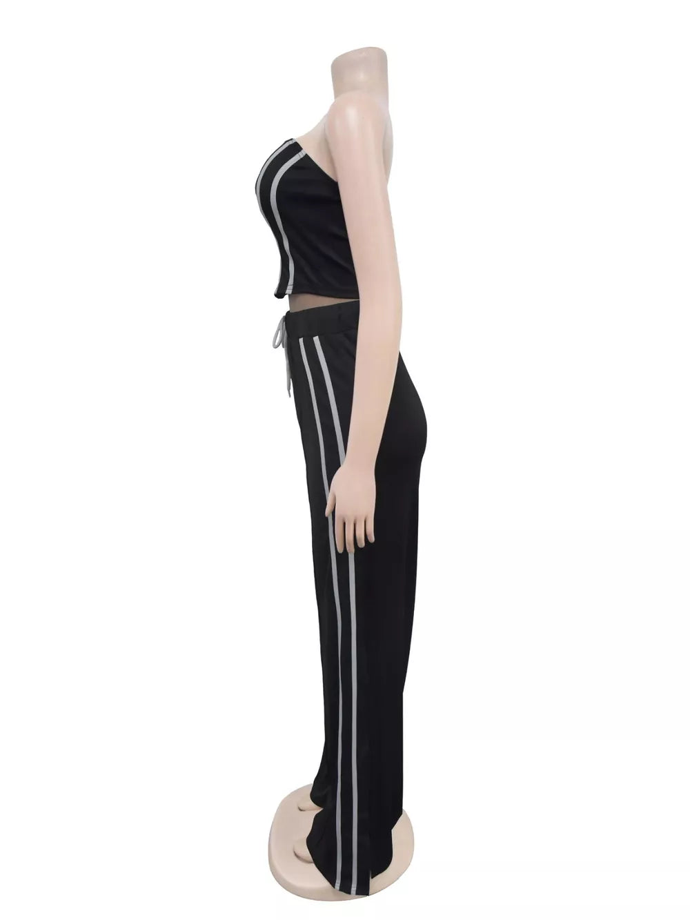 Black tube top and wide-leg pants set with white stripe detail and drawstring waist.