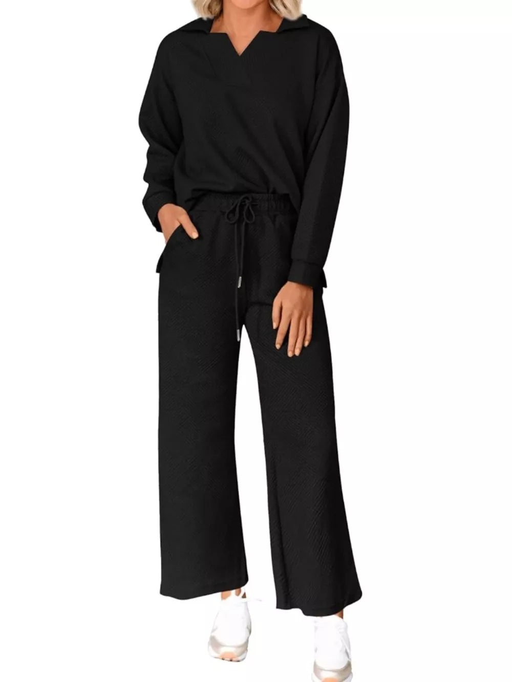 Black V-neck textured lounge set with drawstring pants and long sleeves.