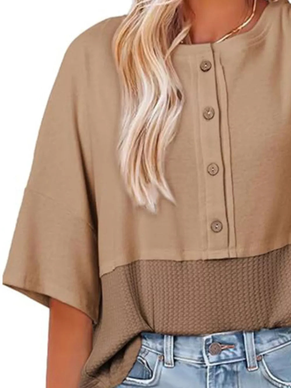 Khaki waffle-knit t-shirt with button detail and short sleeves.