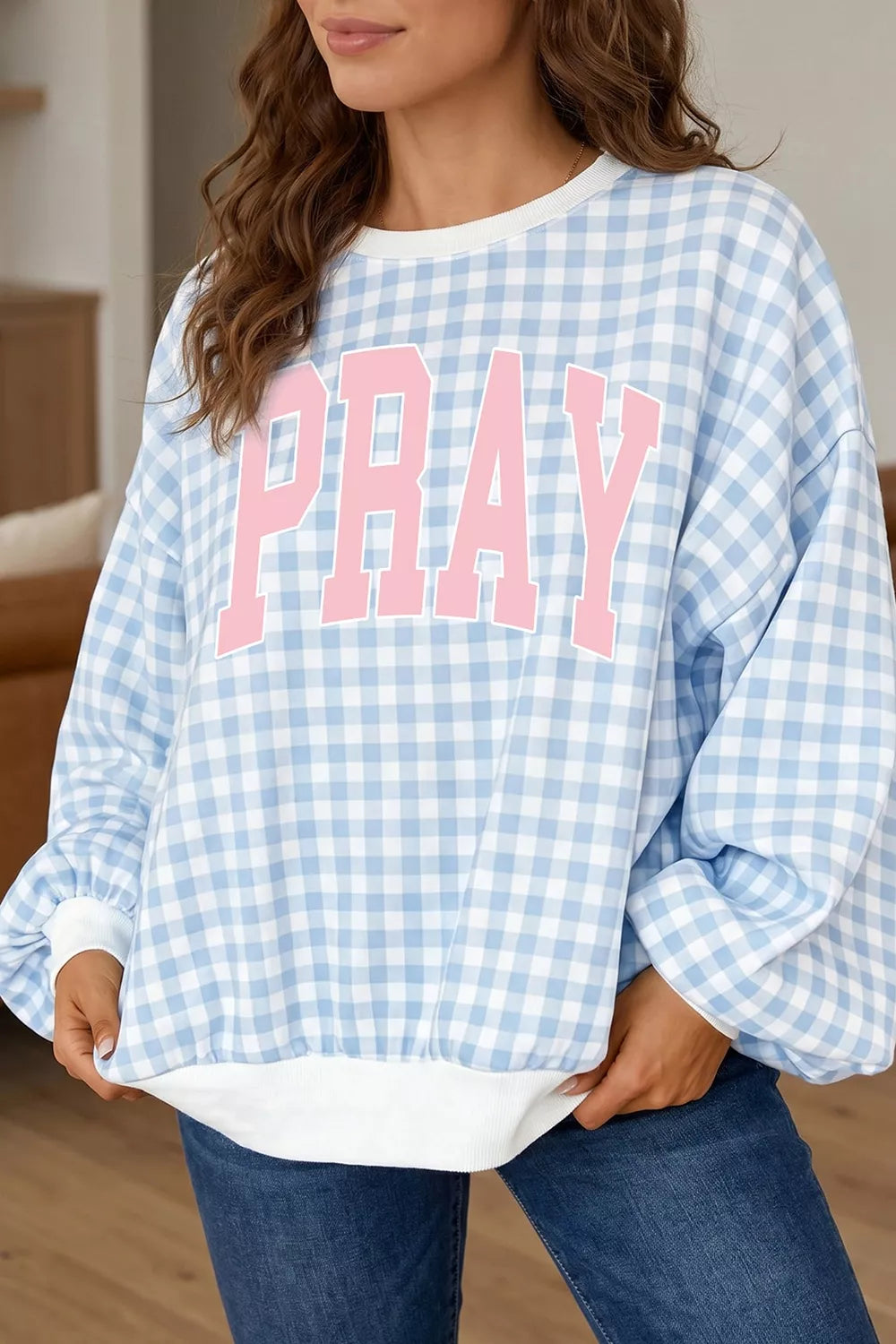 light blue sweatshirt with gingham and round neck