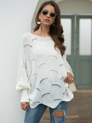 White scalloped knit boat neck sweater with balloon sleeves and open knit pattern