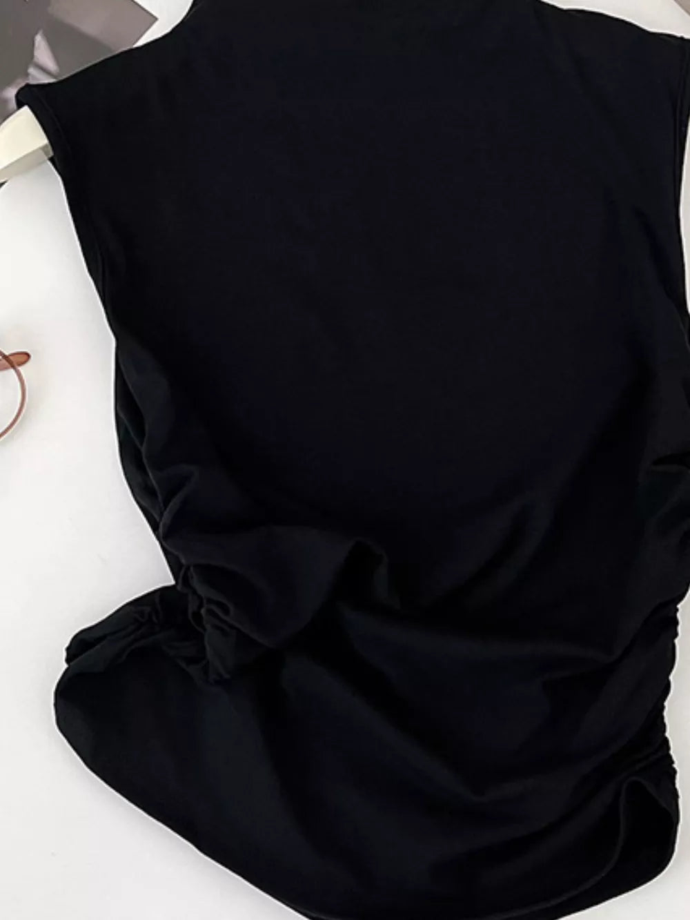 Black mock neck tank top with textured ruching detail on the side.
