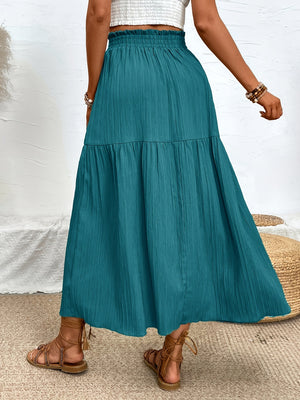 Textured tiered maxi skirt in French Blue with elastic waist and ruffled hem.