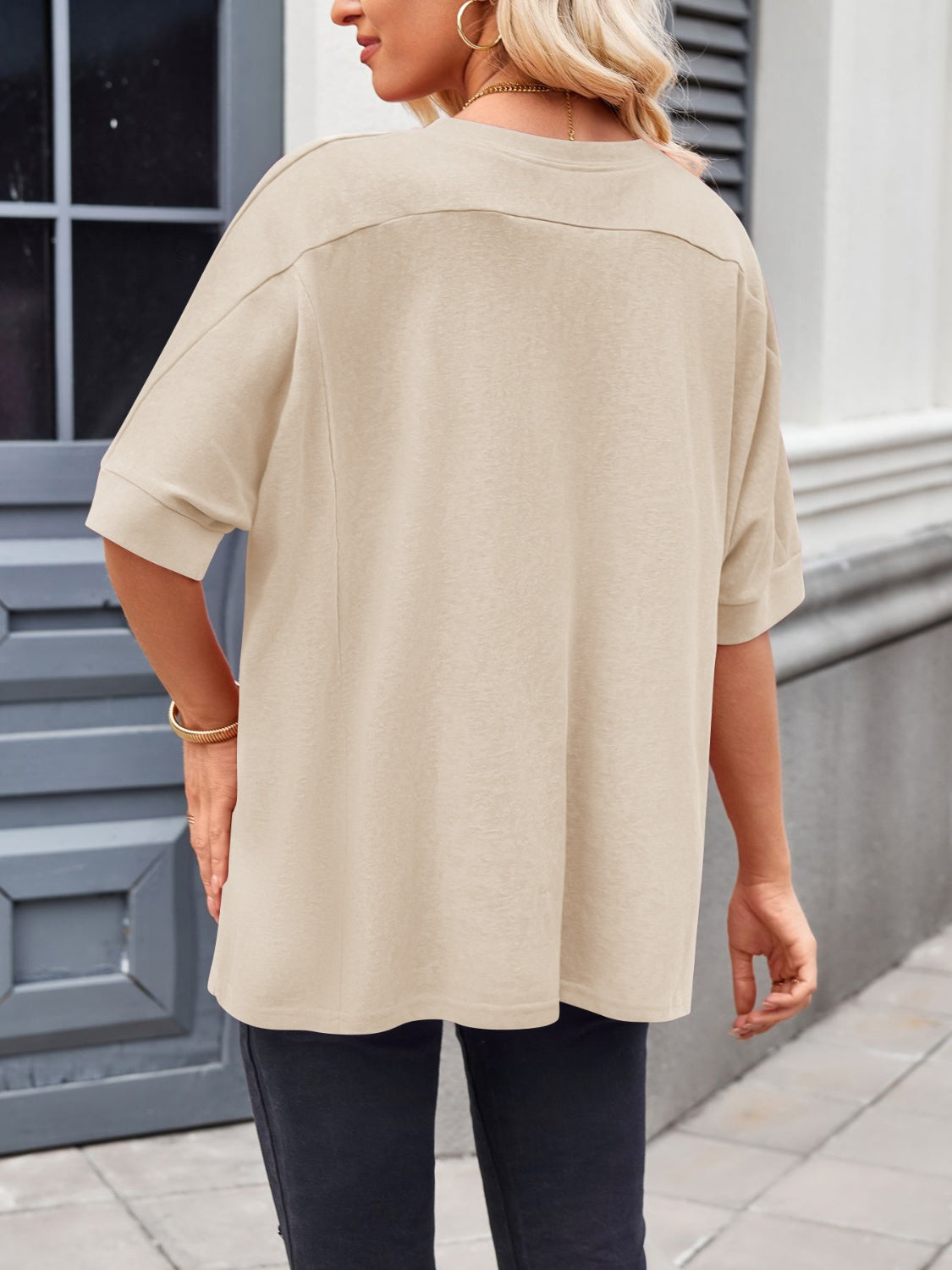 Relaxed drape sleeve tee in Dust Storm with cuffed short sleeves and a crew neck.