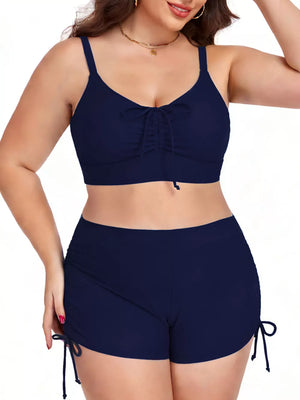 Navy plus size adjustable swimwear set with drawstring shorts and ruched tie-front bikini top.
